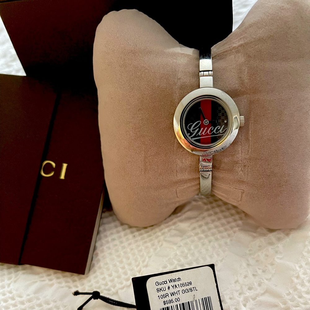 Womens Gucci watch, New - with original box, booklet, tag - original cost 595